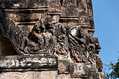 Thailand - Old Sukhothai - Wat Si Sawai. Details of stuccoed carvings of the Khmer style corncob prangs.